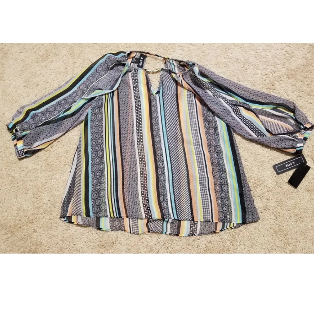A. Byer juniors asymmetrical 3/4 sleeve Sheer top size small new.